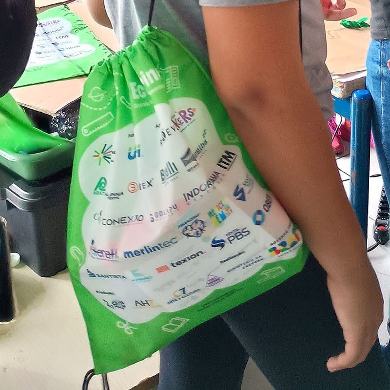 Mochila EcoBrinque Alfenas — verso